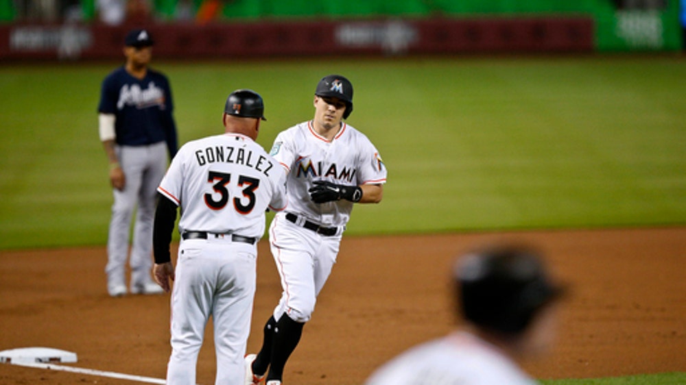 Chen scores 1st run of career to help Miami beat Braves 9-3