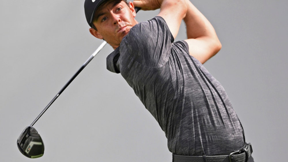 Woods opens with 66 at Firestone just to keep pace