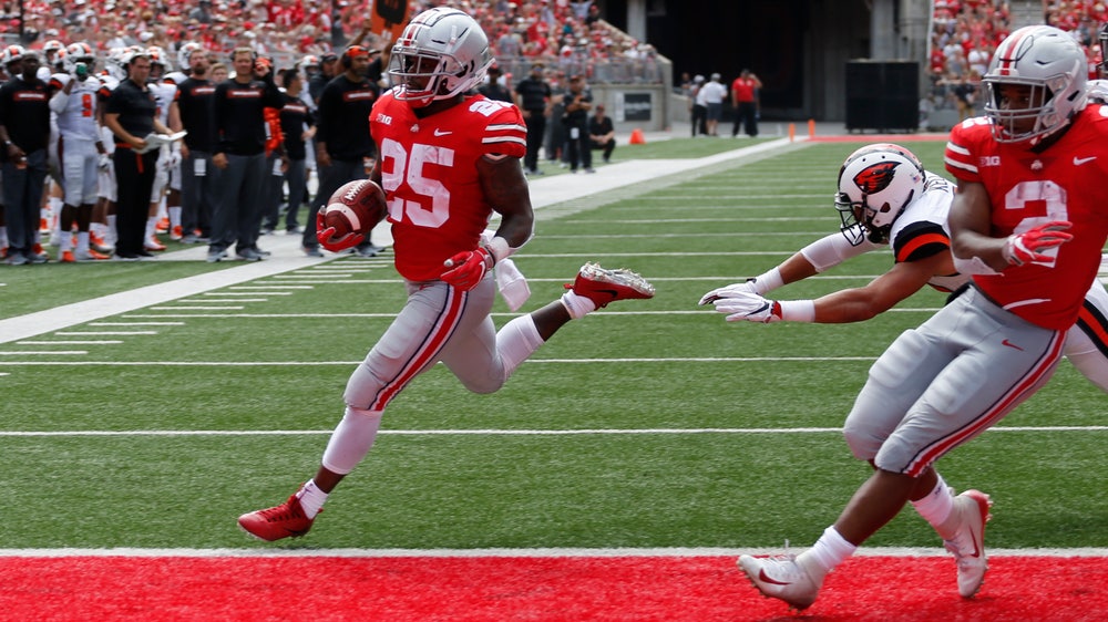 Urban-less Ohio State routs Oregon St 77-31 in opener