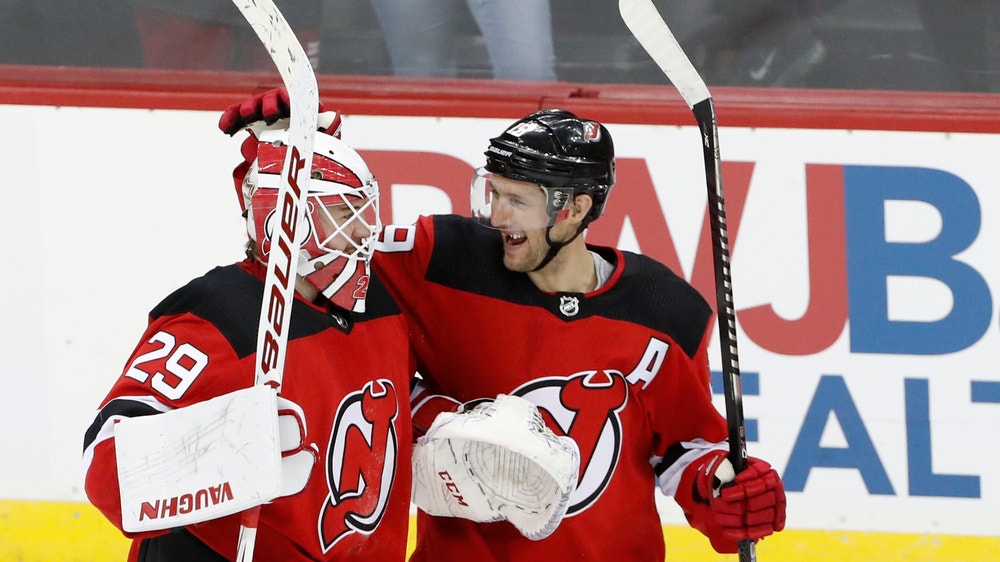 Devils slip past Bruins with 3-2 win in a shootout