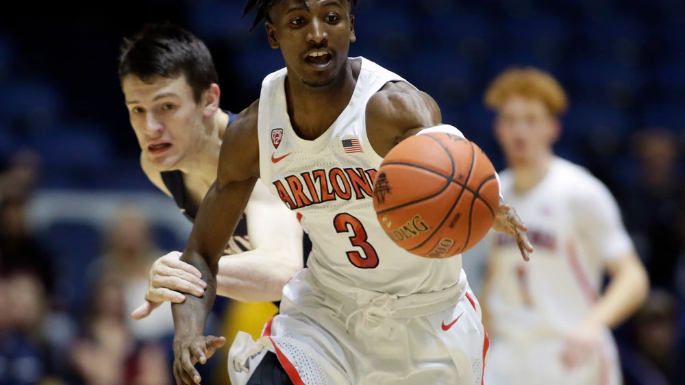 Mannion leads No. 14 Arizona to 92-82 victory over Penn