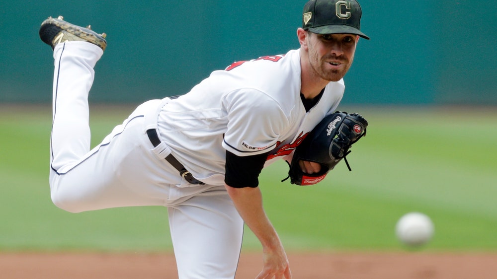 Bieber fans 15 in 1st complete game, Indians rout O’s 10-0