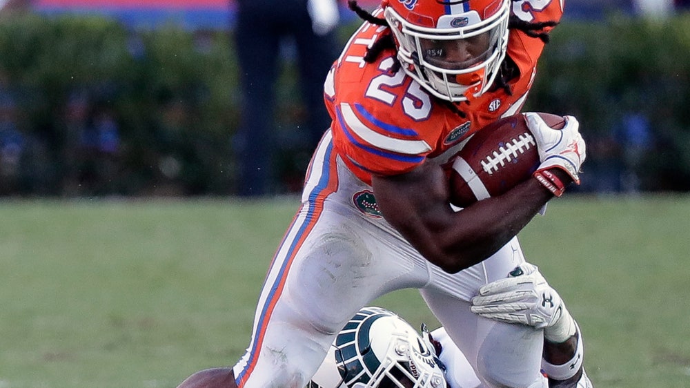 Swain scores twice, Florida handles Colorado State 48-10