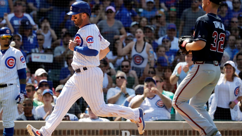 Kimbrel closes out debut with Rizzo's help, Cubs beat Braves