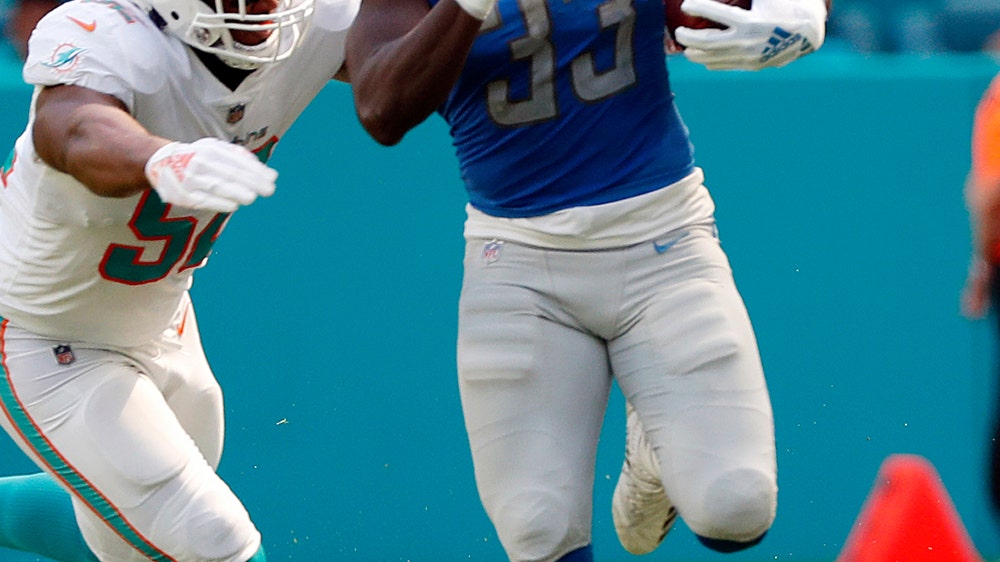 Bad run defense dooms Dolphins in loss to Detroit