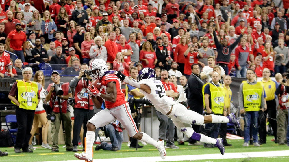 Ohio State pulls away from Wildcats to win Big Ten crown