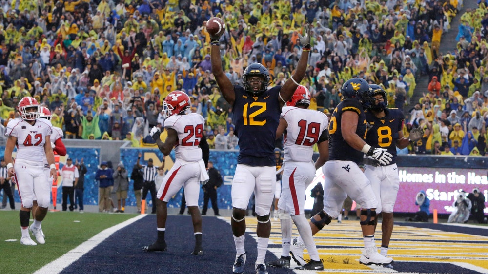 Grier throws 4 TDs, No. 14 WVU beats Youngstown State 52-17