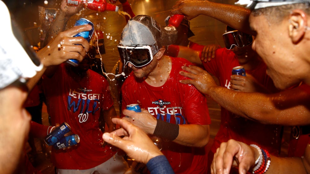 Turner's slam helps Nats sweep Phils, clinch wild card