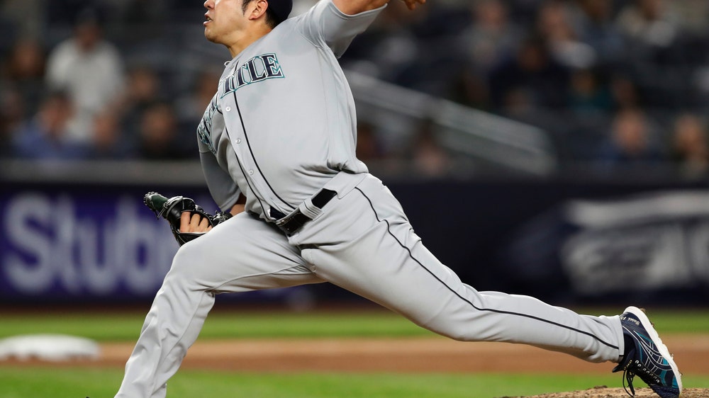 Not a sticky situation: Kikuchi’s hat draws looks, no action