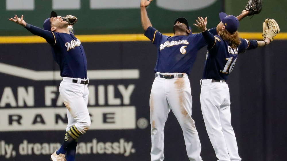 Houser posts 10 Ks, Brewers top Rangers 3-2 for 5th straight