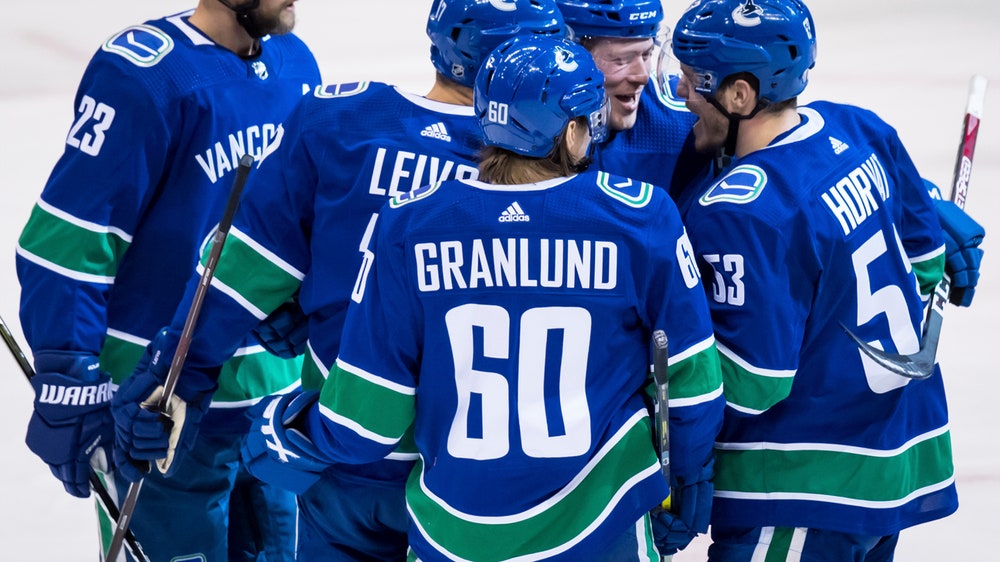 Motte scores 2 as Canucks beat Rangers 4-1