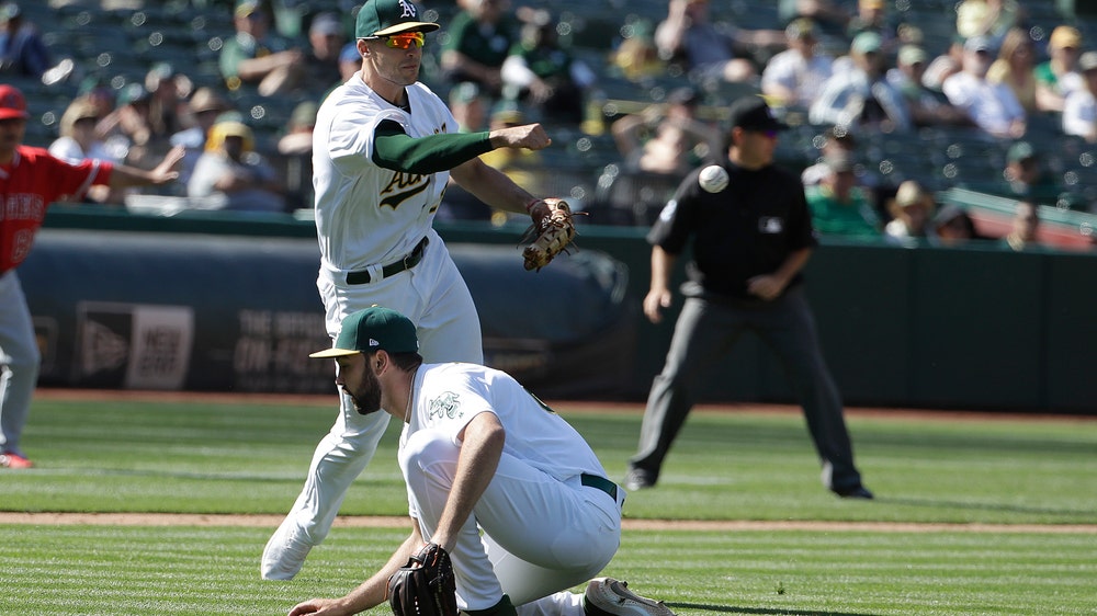 Angels benefit from rare error by Olson to beat A’s 12-7
