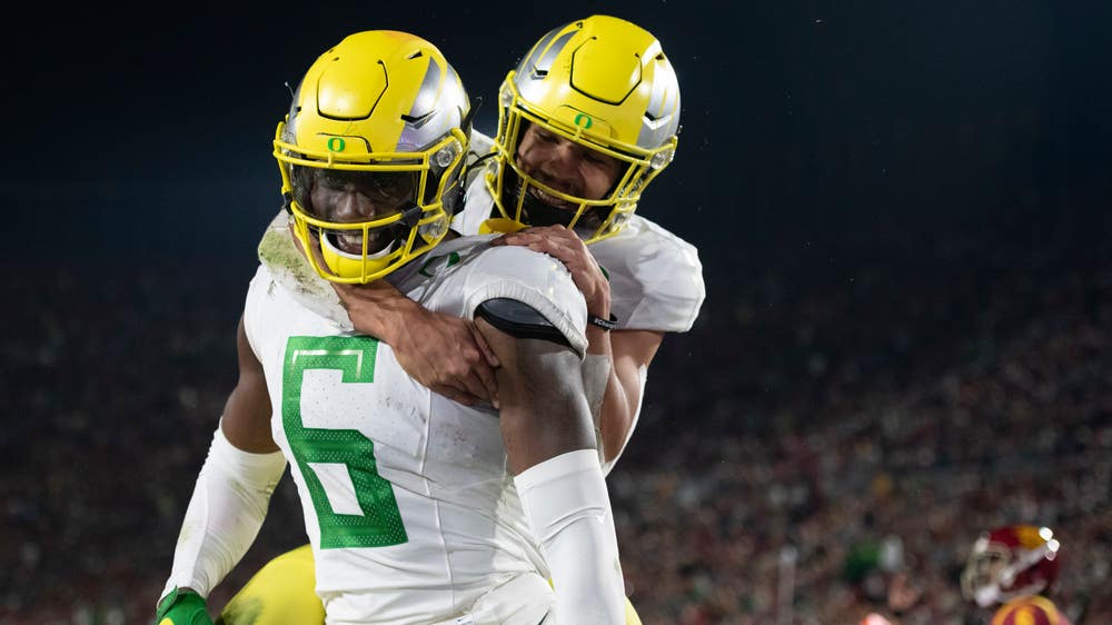 Herbert leads No. 7 Ducks past USC 56-24 to 8th straight win