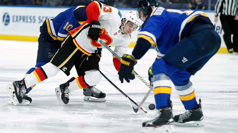 Gaudreau,  Quine score twice to lead Flames past Blues 7-2