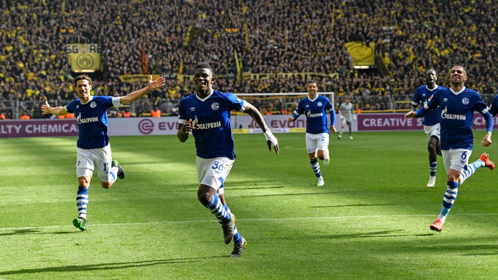 Bayern title boost as 9-man Dortmund loses to Schalke 4-2