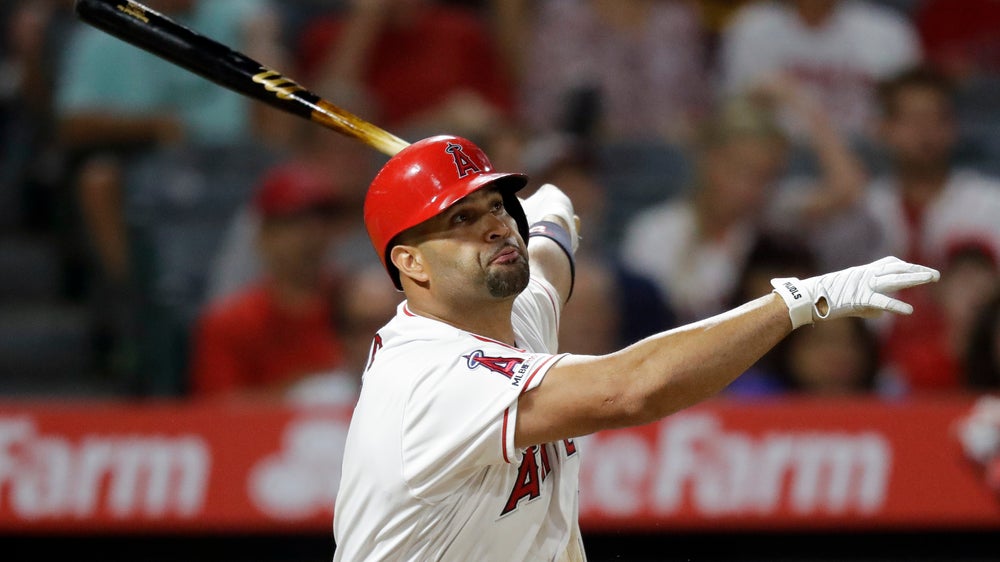 Pujols, Trout help Angels rally for 10-4 win over Red Sox
