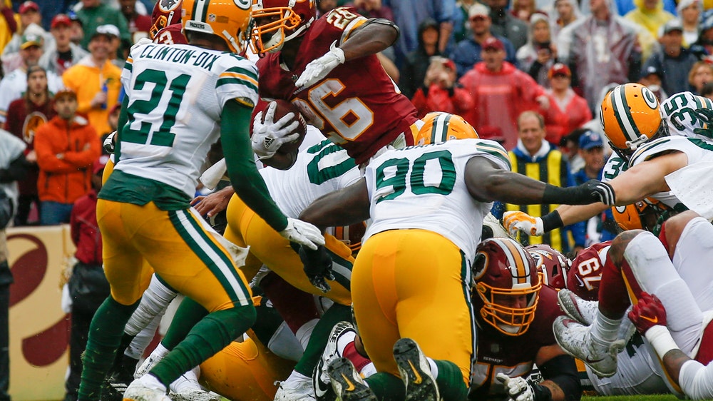 Peterson runs for 120 yards, 2 TDs, Skins top Packers 31-17