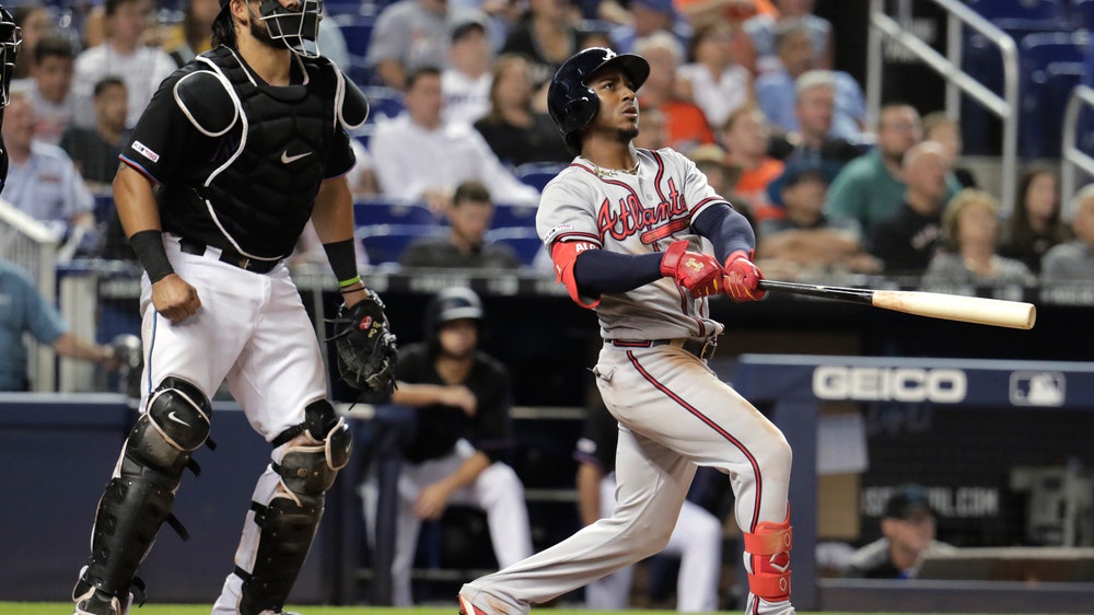 Albies hits a slam, Braves roll past Marlins 9-2