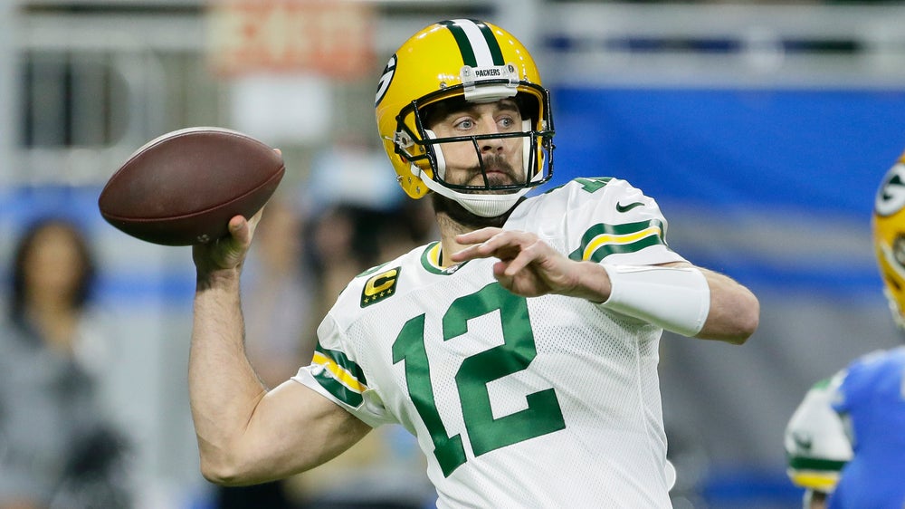 Packers barely beat Lions 23-20 to earn first-round bye