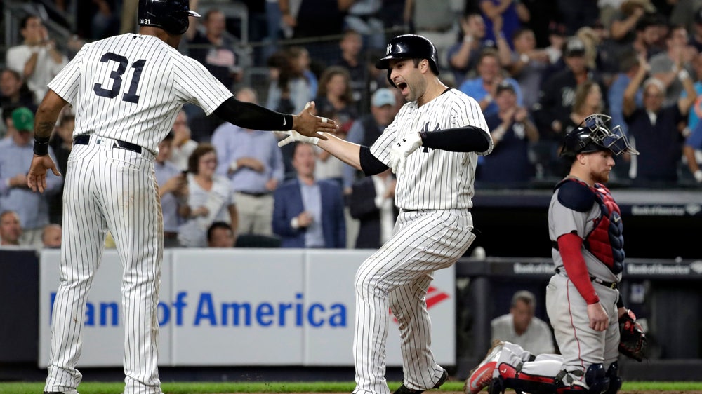 Walker wakes Yanks with HR, Boston’s AL East bash waits