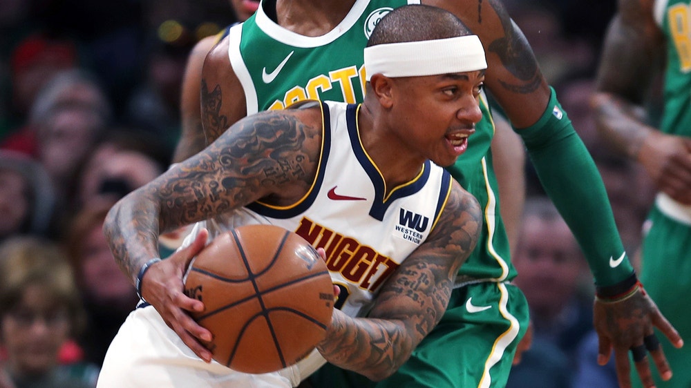 Nuggets clinch playoff berth with 114-105 win over Celtics