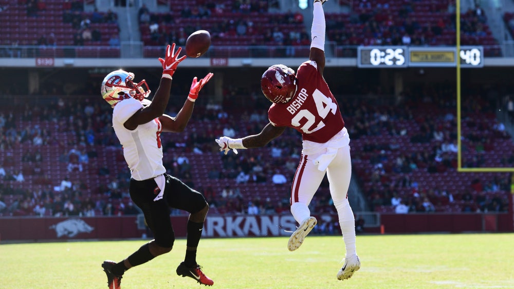 Storey leads Western Kentucky past former team Arkansas