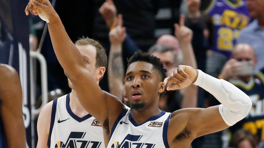 Jazz mascot nets bat on court before game vs. Timberwolves