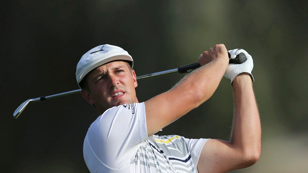 DeChambeau cruises to victory at Dubai Desert Classic