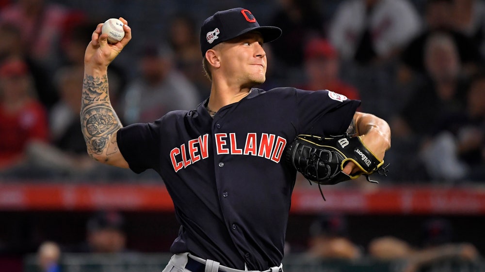 Plesac pitches 4-hitter, Indians keep pace, beat Angels 8-0