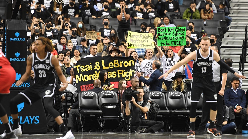 Fans support Hong Kong, Tibet at Nets' 1st game since China
