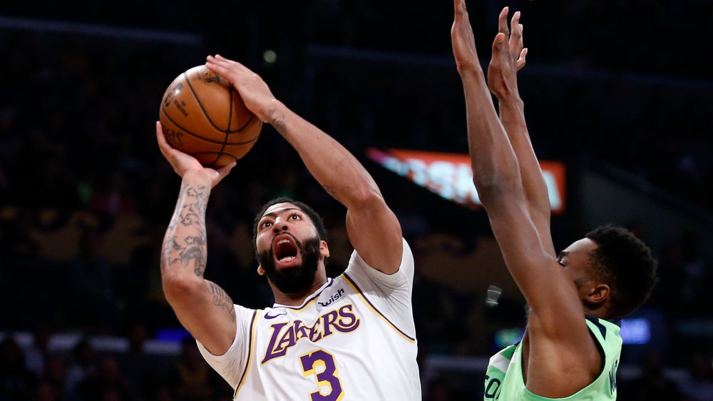 Davis scores 50, powers Lakers to 142-125 win over T-Wolves