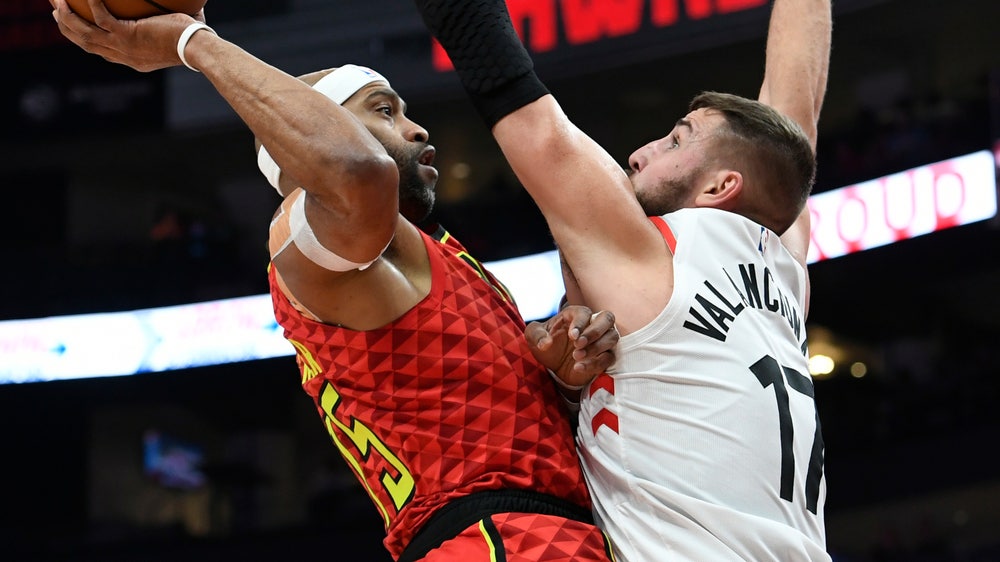 Lowry’s triple-double leads Raptors, Carter gets milestone