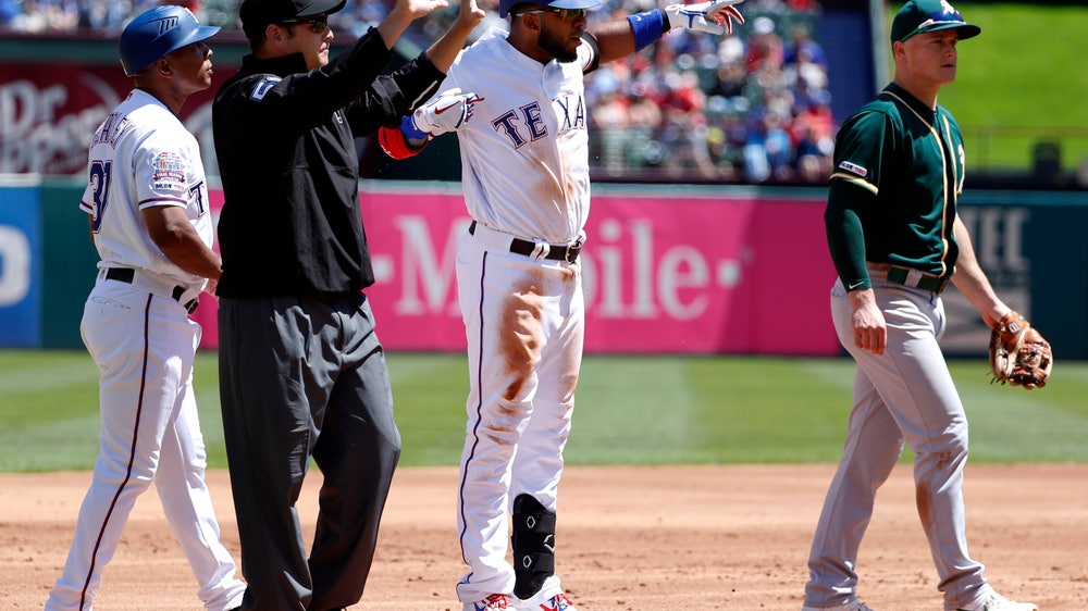 Santana keys 8th-inning rally, Rangers stun A’s 8-7