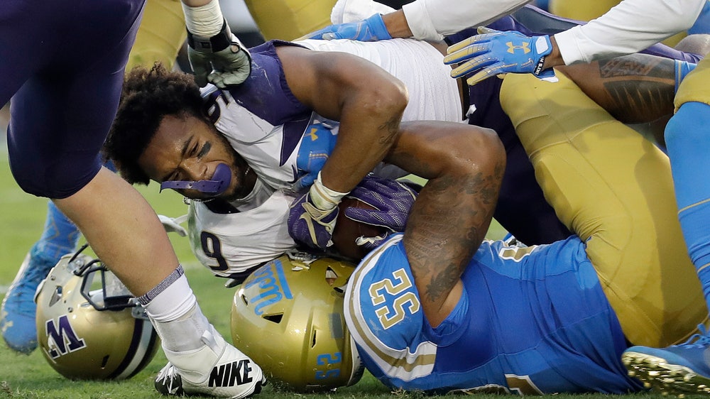 Gaskin runs for 2 TDs, No. 10 Washington beats UCLA 31-24