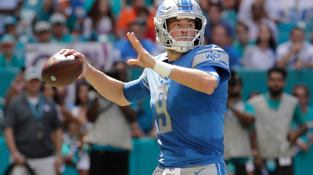Johnson’s 158 yards rushing help Lions beat Dolphins 32-21