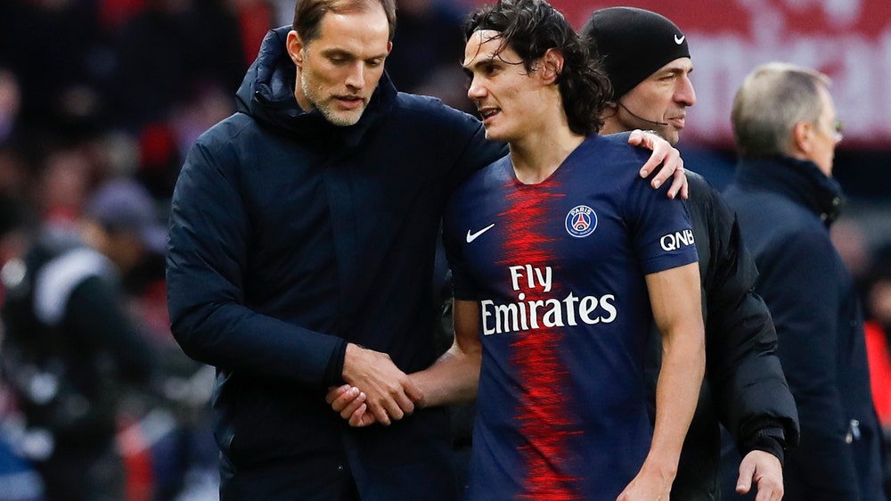 PSG striker Edinson Cavani limps off injured in home win