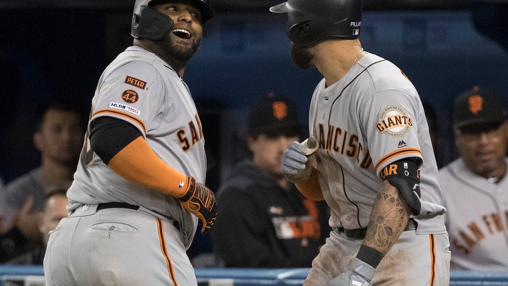 Giants hit 4 homers, outlast Blue Jays 7-6