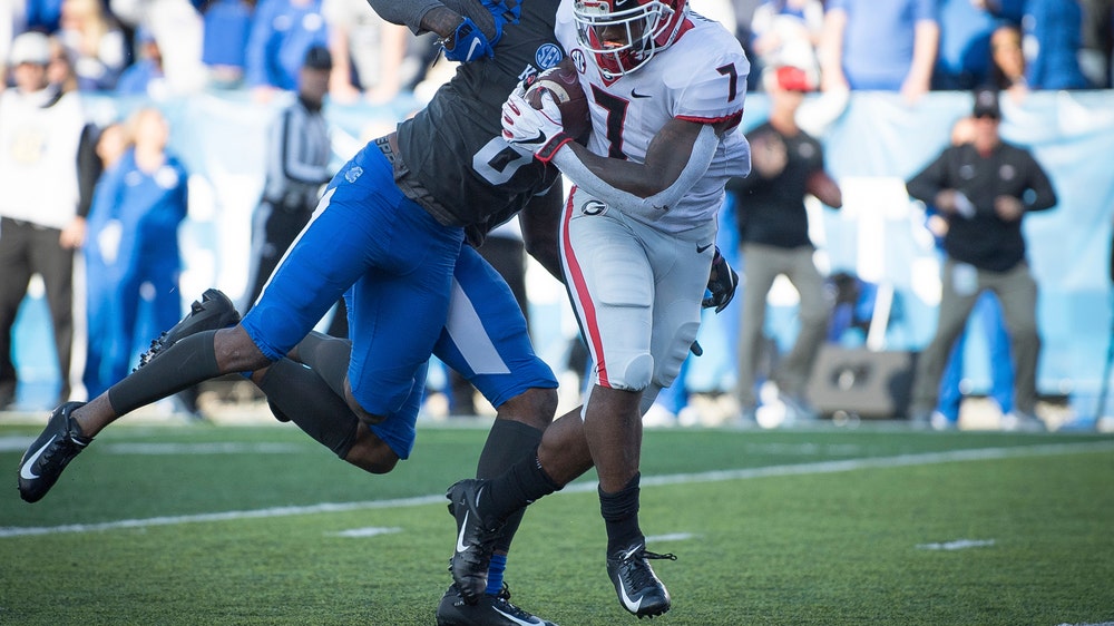 No. 6 Georgia tops No. 11 Kentucky 34-17 to clinch SEC East