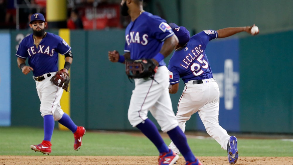 Rangers reliever Leclerc throws ball onto roof, tops Tigers