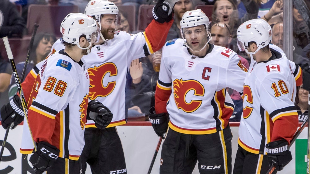 Giordano leads Flames past Canucks 3-1