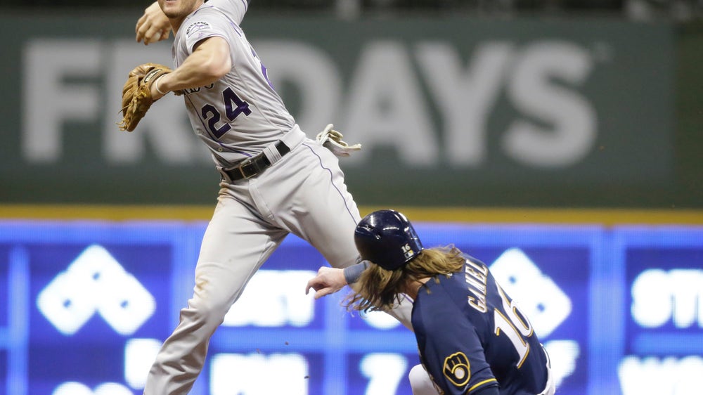Arenado, Dahl, Tapia HRs lead Rockies over Brewers 11-6