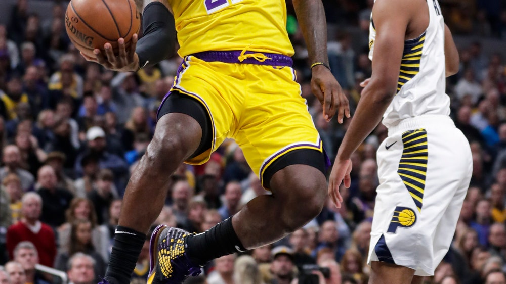 Pacers rally late to snap Lakers' road winning streak at 14