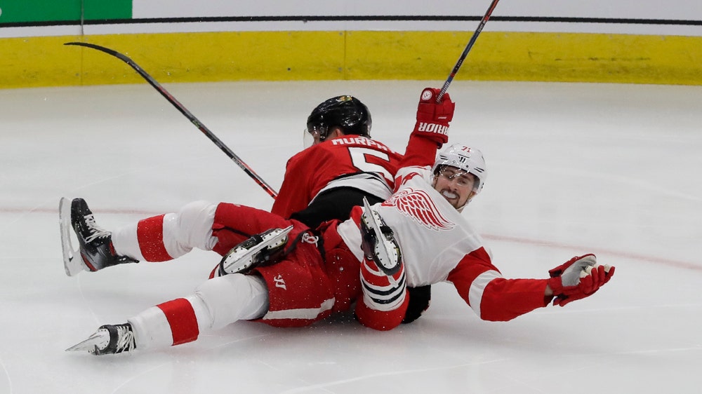 Sikura, Blackhawks rally past lowly Red Wings 4-2