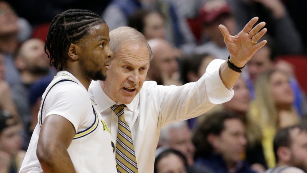 Matthews' double-double leads Michigan past Grizzlies, 74-53