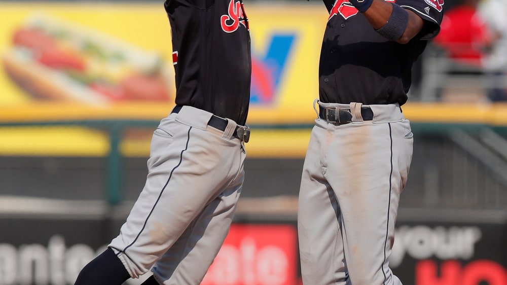 Carrasco strikes out 9 as Indians hold off White Sox 9-7