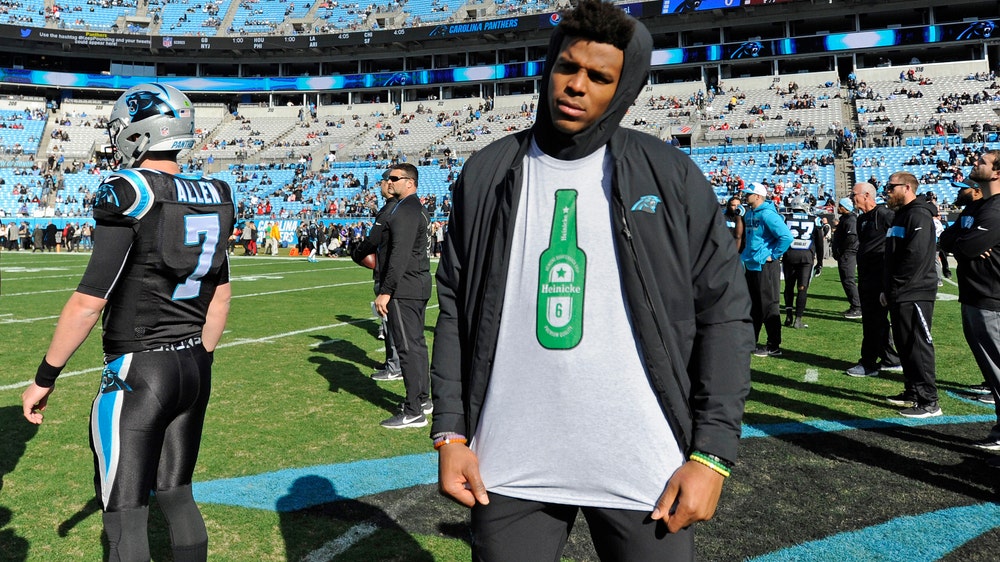The Latest: Taylor Heinicke gets start with Cam Newton out