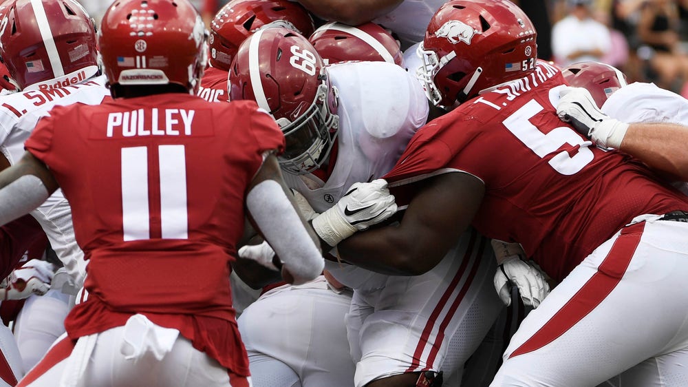 Tagovailoa throws 4 TD as No. 1 Alabama beats Arkansas 65-31