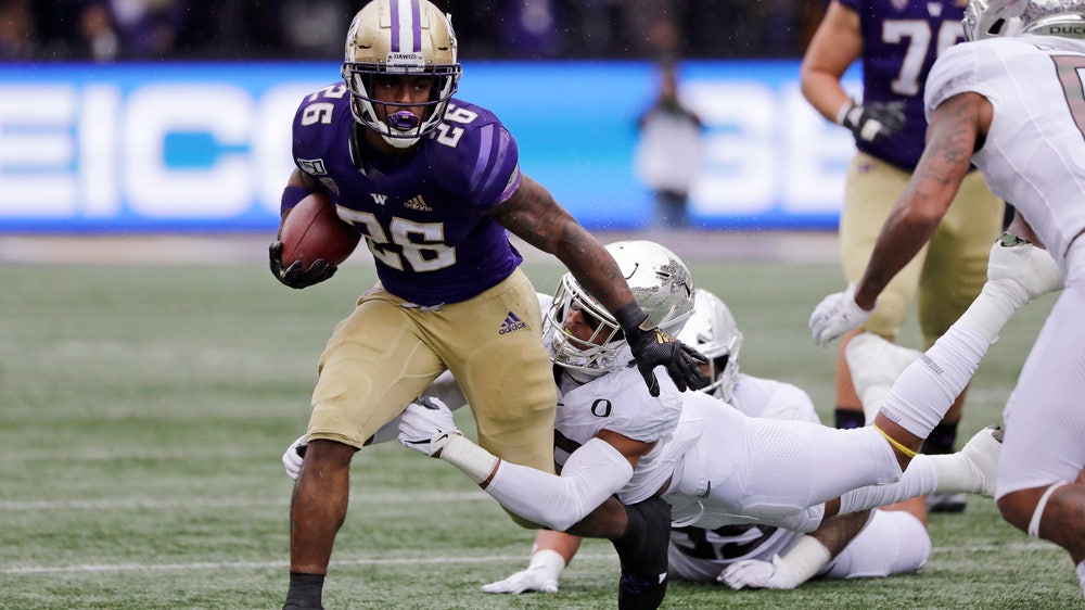 Herbert rallies No. 12 Oregon past No. 25 Washington 35-31