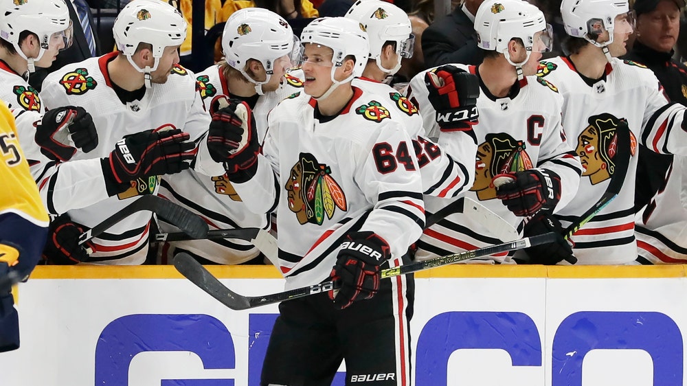 Kane stars as Blackhawks pound Predators 7-2