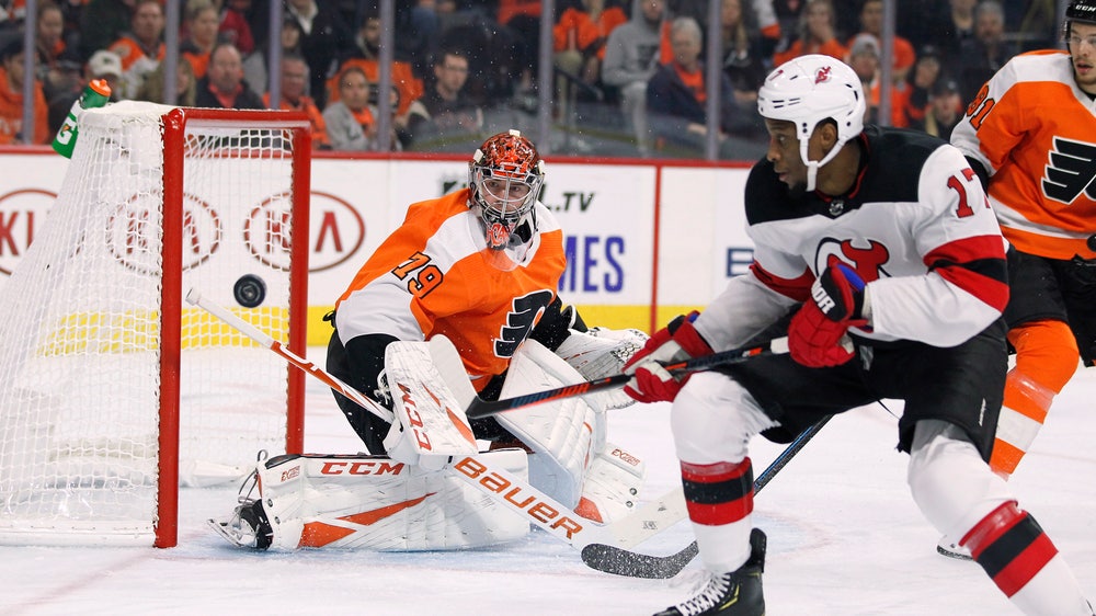 Hart shines in 1st shutout, Flyers top Devils 4-0